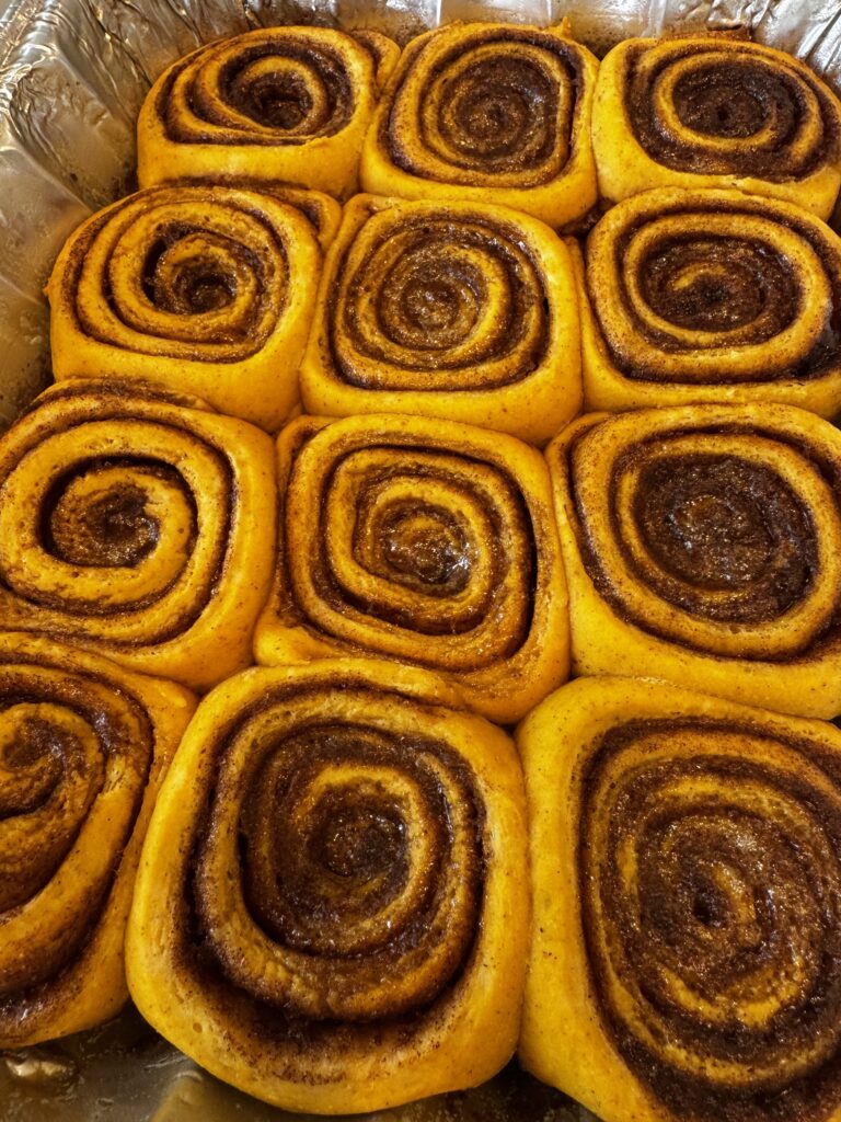 freshly baked pumpkin cinnamon rolls